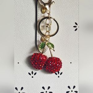 NWT keychain/clip on charm gold toned cherries attached to rings that detach